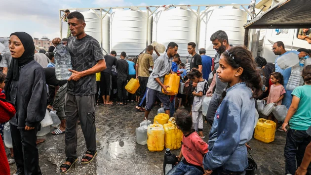 GHF unveils new ‘flag system’ at aid site in southern Gaza as Palestinians continue to report chaos, deaths