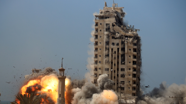 Israel levels Gaza high-rise tower near Palestinian civilian encampment